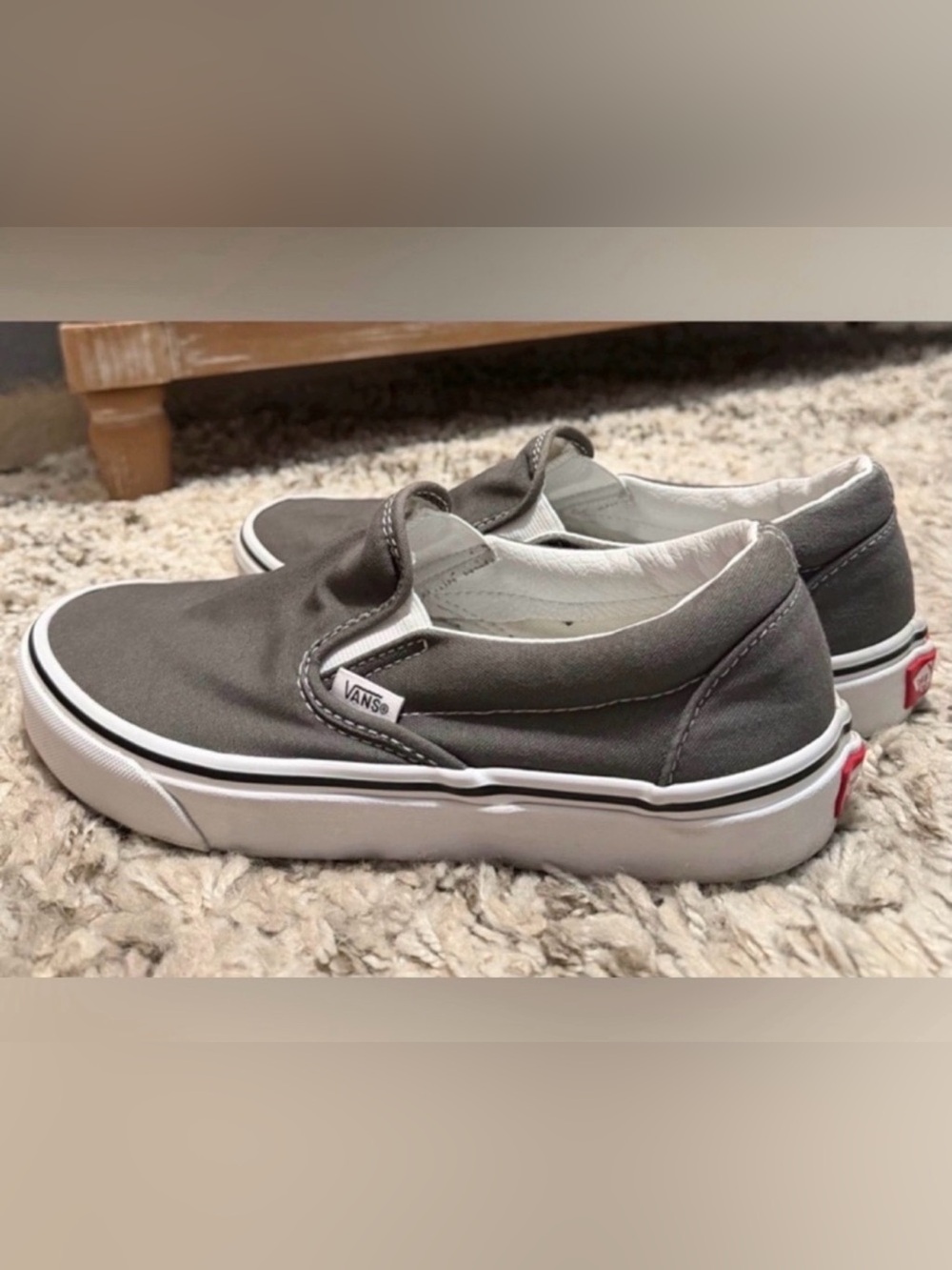 Vans 🩶 Slip-On Sneakers in Charcoal Gray with White Trim (women's 8.5 men's 7)